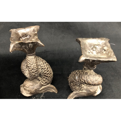 2278 - A pair of bronze Koi fish candlesticks, 18cm high and a pair of composition elephants, 15cm high ove... 