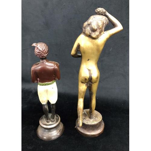 2280 - A bronze figure of a nude female holding grapes, 34cm high and a bronze Eastern figure of a man hold... 