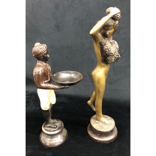 2280 - A bronze figure of a nude female holding grapes, 34cm high and a bronze Eastern figure of a man hold... 