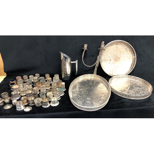 2285 - A large quantity of various silver plated condiment bases, a plated oval tray, 45.5cm x 29cm, 2 othe... 