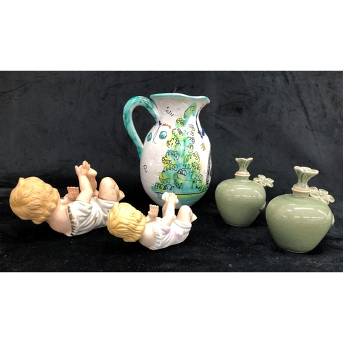 2291 - A pair of small green glazed vases with stoppers 10cm high, 2 Continental figures of cherubs and a S... 