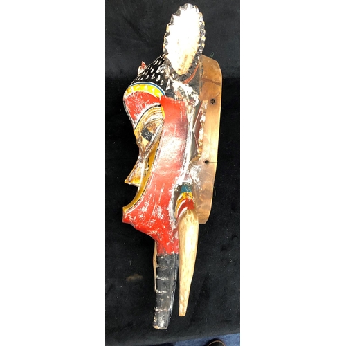 2297 - A wooden painted African style mask, 46cm long, an African wooden carved paperweight, 21.5cm long an... 