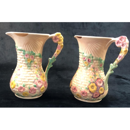 2305 - A pair of Arthur Wood Garden Wall jugs, 20.5cm high. (2)