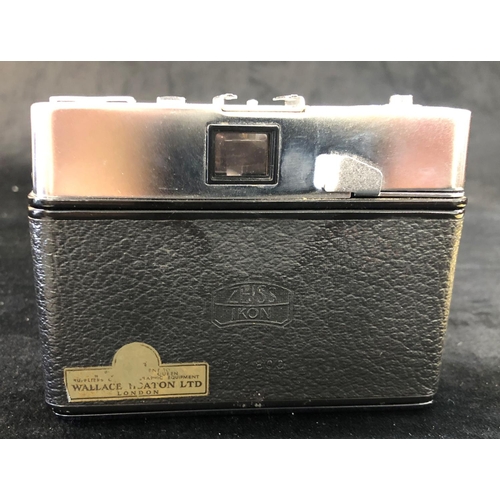 2310 - A Zeiss Ikon Contessa LK camera, no. D51800, in brown leather case, with original manual and sales r... 