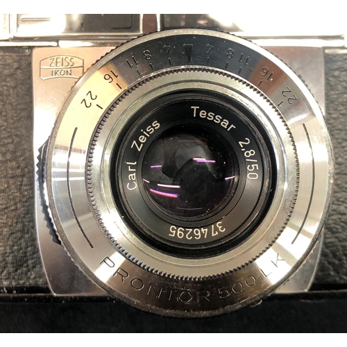 2310 - A Zeiss Ikon Contessa LK camera, no. D51800, in brown leather case, with original manual and sales r... 