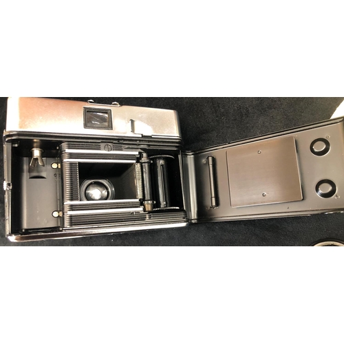 2310 - A Zeiss Ikon Contessa LK camera, no. D51800, in brown leather case, with original manual and sales r... 