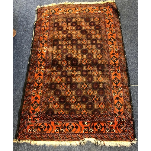 2313 - A small rug on red ground, 91cm wide, 154cm long.