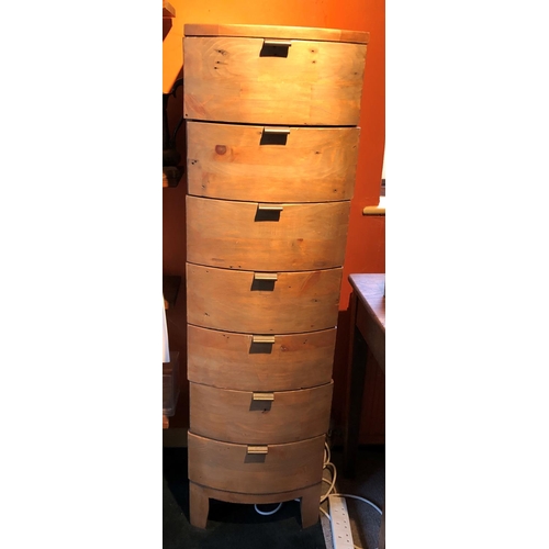 2324 - A narrow bow fronted chest of drawers, 40cm wide, 44cm deep, 139cm high overall.
This Lot is not hel... 