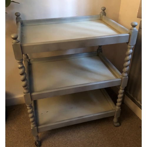 2332 - A grey painted wooden trolley, 3 shelves and on castor wheels, 61.5cm wide, 42.5cm deep, 80cm high. ... 