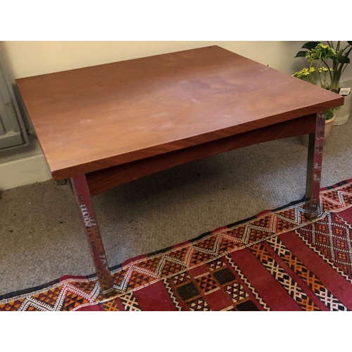 2333 - A modern low-level square coffee table on chrome legs, top 61cm x 61cm, 32.5cm high. This Lot is not... 