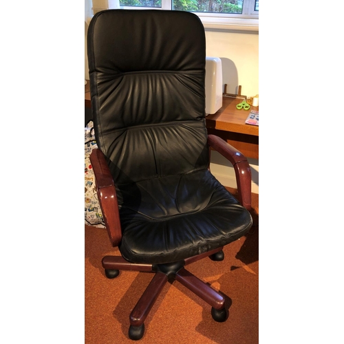 2340 - A black leather effect desk chair on castors, adjustable seat height, 62cm wide, 54cm deep, 128cm wi... 