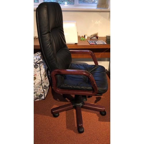 2340 - A black leather effect desk chair on castors, adjustable seat height, 62cm wide, 54cm deep, 128cm wi... 