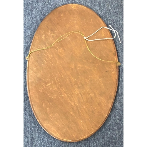 2168 - An Edwardian mahogany oval wall mirror with wood frame, 46.5cm x 70.5cm.