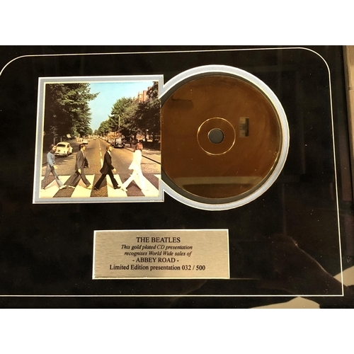 2237 - A limited edition Beatles gold plated CD of Abbey Road, 032/500, An Eric Stewart and Rick Fenn (10CC... 