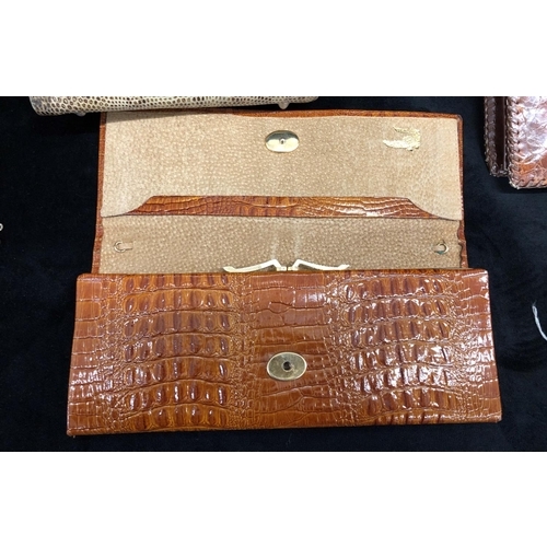 2257 - A Pierre Cardin crocodile skin handbag, 3 other crocodile skin clutch bags and a snakeskin effect ha... 