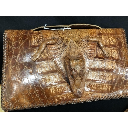 2257 - A Pierre Cardin crocodile skin handbag, 3 other crocodile skin clutch bags and a snakeskin effect ha... 