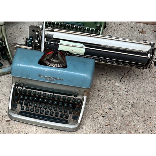 2064 - An Imperial 66 typewriter, another similar typewriter and a Remington Standard typewriter (all in ne... 