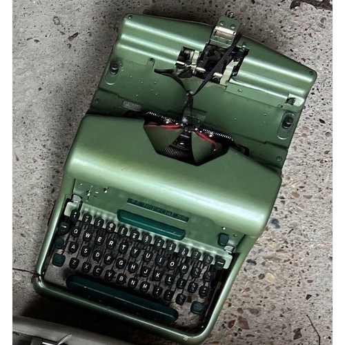 2064 - An Imperial 66 typewriter, another similar typewriter and a Remington Standard typewriter (all in ne... 