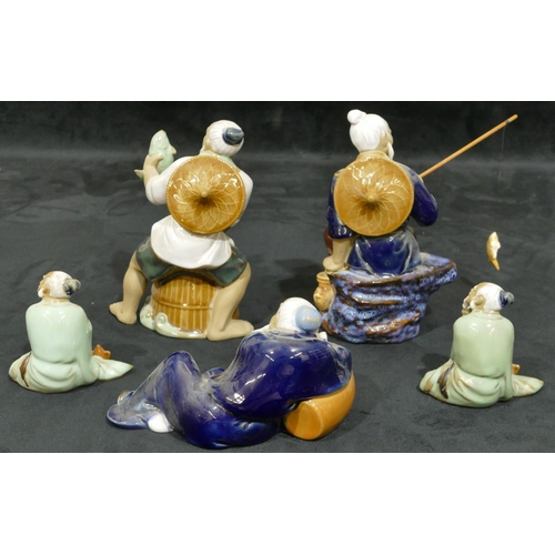 3291 - 5 glazed earthenware figures of Oriental gentlemen fishing etc, largest 18cm high.