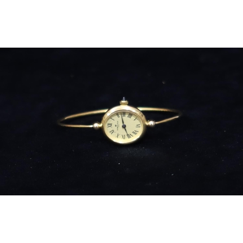 3545 - Gorges Velic, Paris, ladies' oval bangle wristwatch with gilt dial (working)