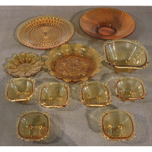 3062 - A quantity of brown tinted glass dishes, including a set of 6 small bowls and larger bowl. (This ite... 