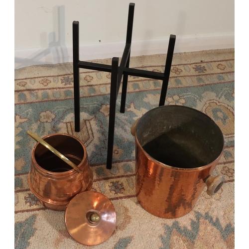 3066 - A modern beaten brass ice bucket on black metallic stand, 45cm high overall and a small copper and b... 