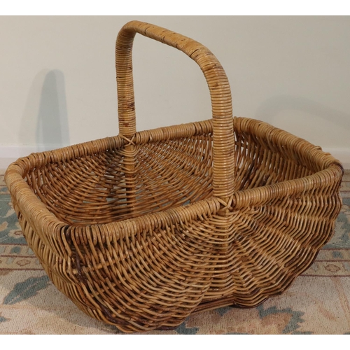 3074 - A large wicker basket, 60cm wide, 45deep, 48cm high including handle. (This item is not held by PF W... 