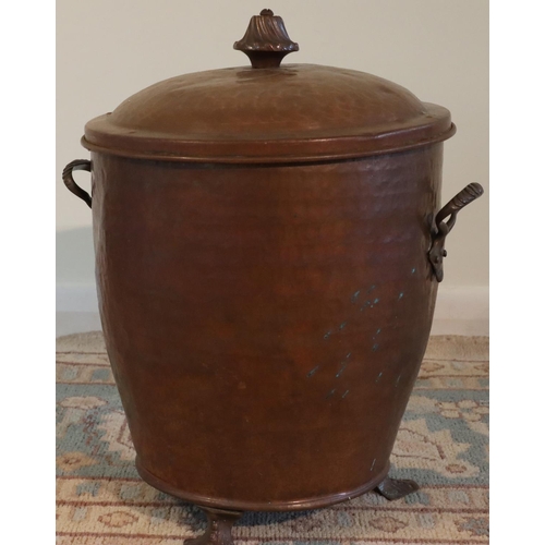 3079 - A copper 2-handled pot on 3 legs with lid, 40cm high overall. (This item is not held by PF Windibank... 