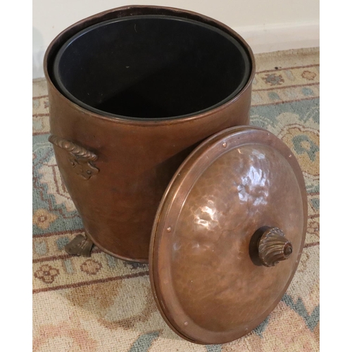 3079 - A copper 2-handled pot on 3 legs with lid, 40cm high overall. (This item is not held by PF Windibank... 