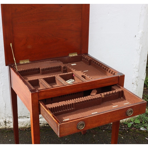 3080 - A mahogany canteen case with hinged top and 1 long drawer enclosing sectioned interior on square tap... 