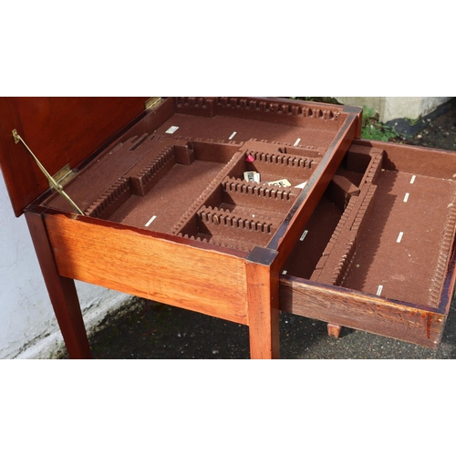 3080 - A mahogany canteen case with hinged top and 1 long drawer enclosing sectioned interior on square tap... 