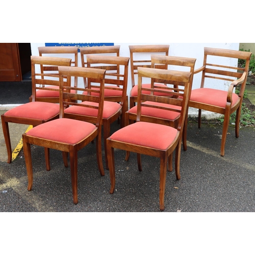 3081 - A set of 9 mahogany dining chairs (8 singles and 1 carver) with slat backs, velvet drop-in seats on ... 