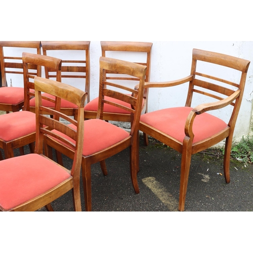 3081 - A set of 9 mahogany dining chairs (8 singles and 1 carver) with slat backs, velvet drop-in seats on ... 