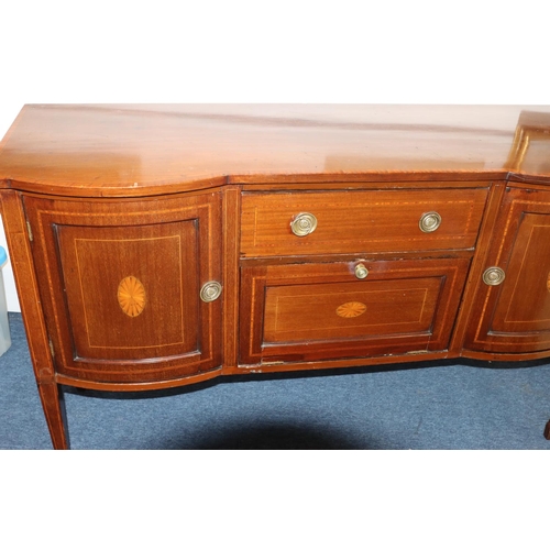 3087 - An Edwardian mahogany sideboard with allover inlaid shell motif and banding, centre drawer above dro... 