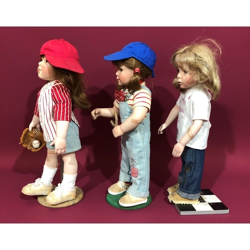 3091 - 3 Danbury Mint dolls, all with stands, approx. 48cm high without stands.