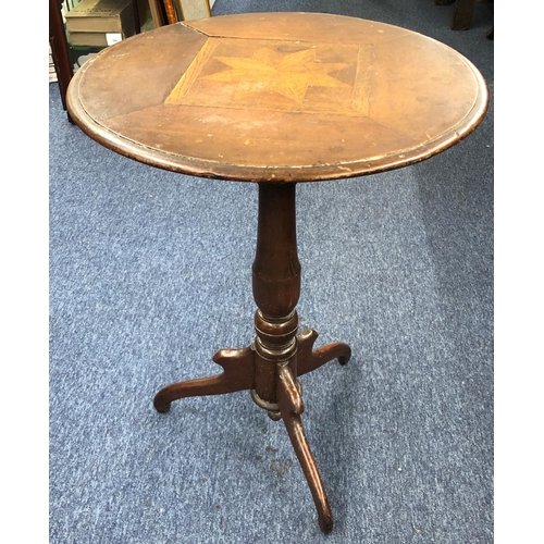 3100 - A small circular topped occasional table with inlaid star to top, 55cm diameter, 70.3cm high.