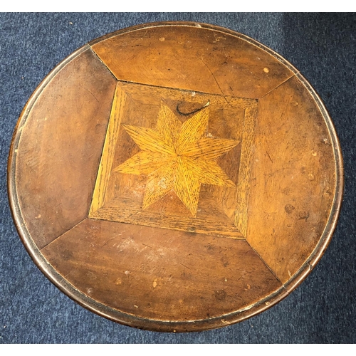 3100 - A small circular topped occasional table with inlaid star to top, 55cm diameter, 70.3cm high.