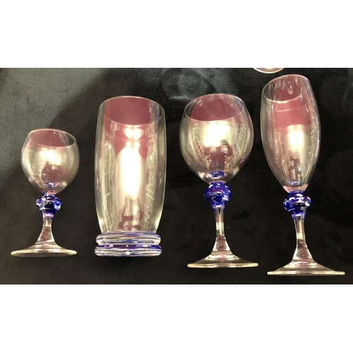 3102 - A set of glasses with blue and white detail, 10 champagne glasses 19cm high, 6 wine glasses 15.3cm h... 