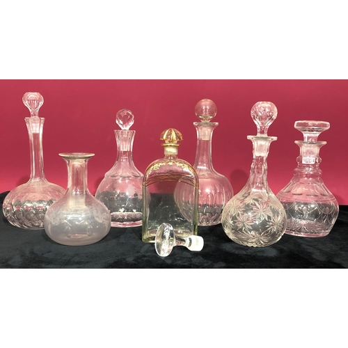 3105 - 7 glass decanters with stoppers and 1 odd glass stopper, tallest 23.5cm high