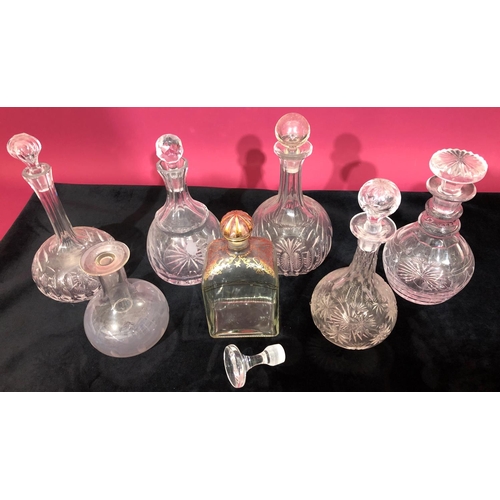 3105 - 7 glass decanters with stoppers and 1 odd glass stopper, tallest 23.5cm high