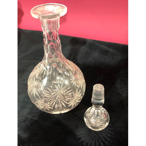 3105 - 7 glass decanters with stoppers and 1 odd glass stopper, tallest 23.5cm high