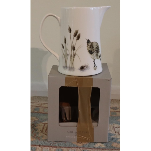 3118 - A Gisela Graham London fine porcelain jug on cream ground with bird pattern, 18cm high, with origina... 