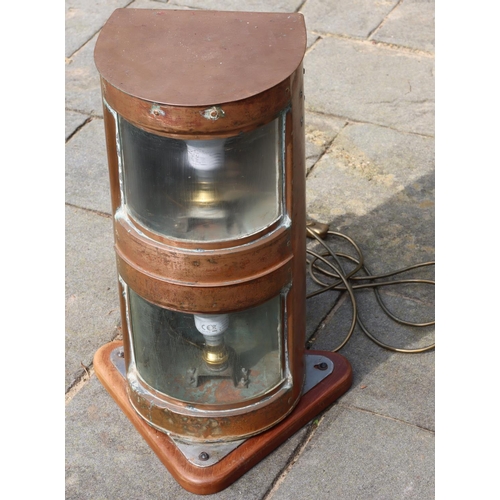 3140 - A converted brass lamp, with 2 bulbs, on wood base, 50.5cm high, 33cm x 33cm to base. (Working) (Thi... 