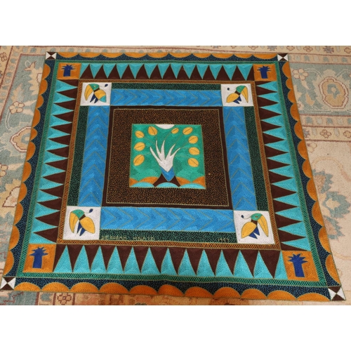 3157 - A multi-coloured square embroidered fabric table covering with bird and tree decoration, 91.5 x 91.5... 