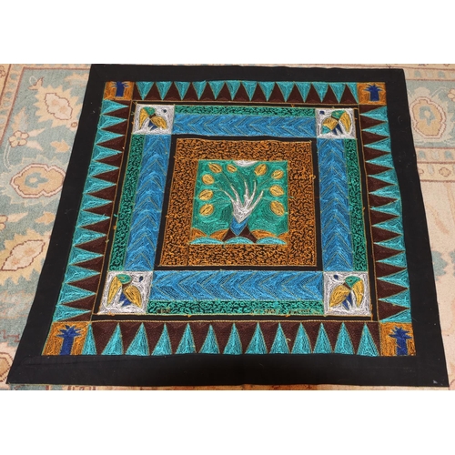 3157 - A multi-coloured square embroidered fabric table covering with bird and tree decoration, 91.5 x 91.5... 