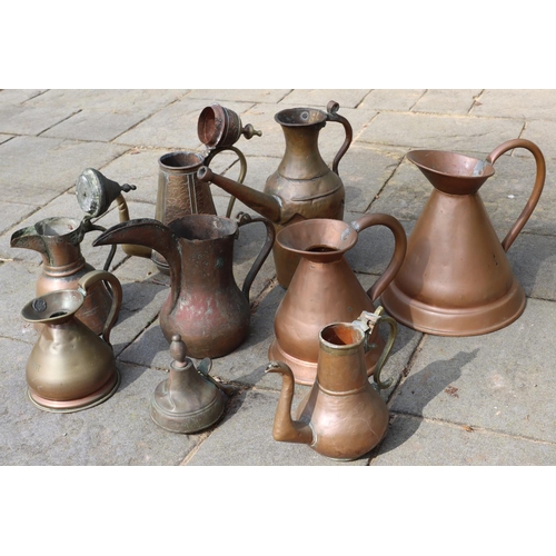 3160 - A quantity of copper and brass jugs, coffee pots etc. (This item is not held by PF Windibank - pleas... 