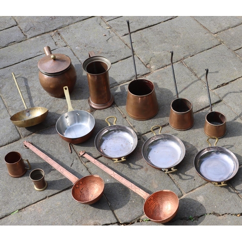 3162 - A quantity of copper and brass measuring jugs, small pans, ladles etc. (This item is not held by PF ... 