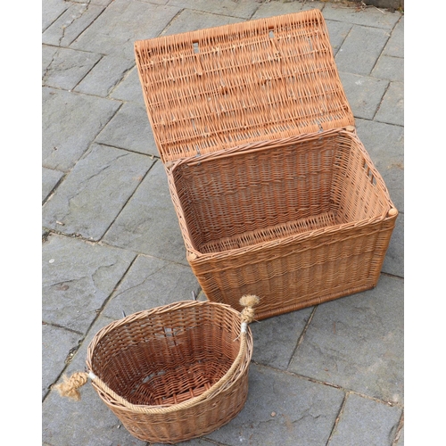 3169 - A wicker hamper with hinged lid, 53cm wide, 35.5cm deep, 32.5cm high and  a wicker basket with rope ... 