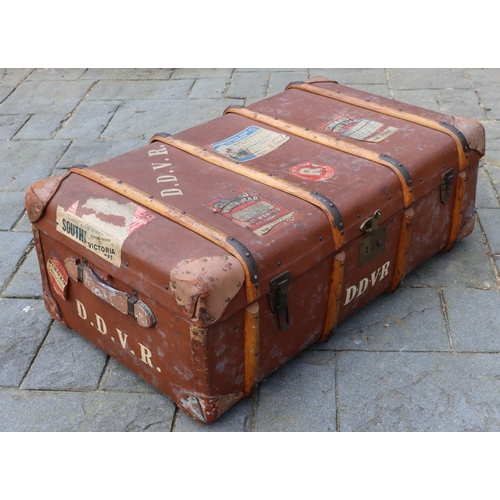 3170 - A brown trunk with leather handles, brass locks, enclosing interior lift out tray, 93cm wide overall... 