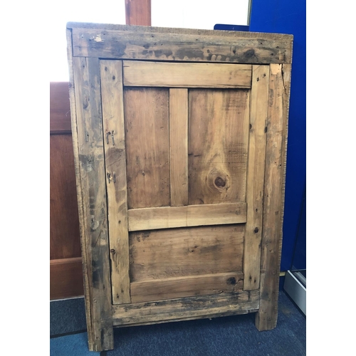 3181 - A small pine door and frame with carved detail and metal handle, 72cm wide, 107.5cm high, 54cm wide,... 